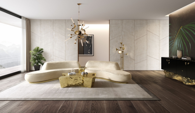 Nude sofa, gold coffee table, chandelier gold, black sideboard, nude rug, neutral tones in a luxury living room